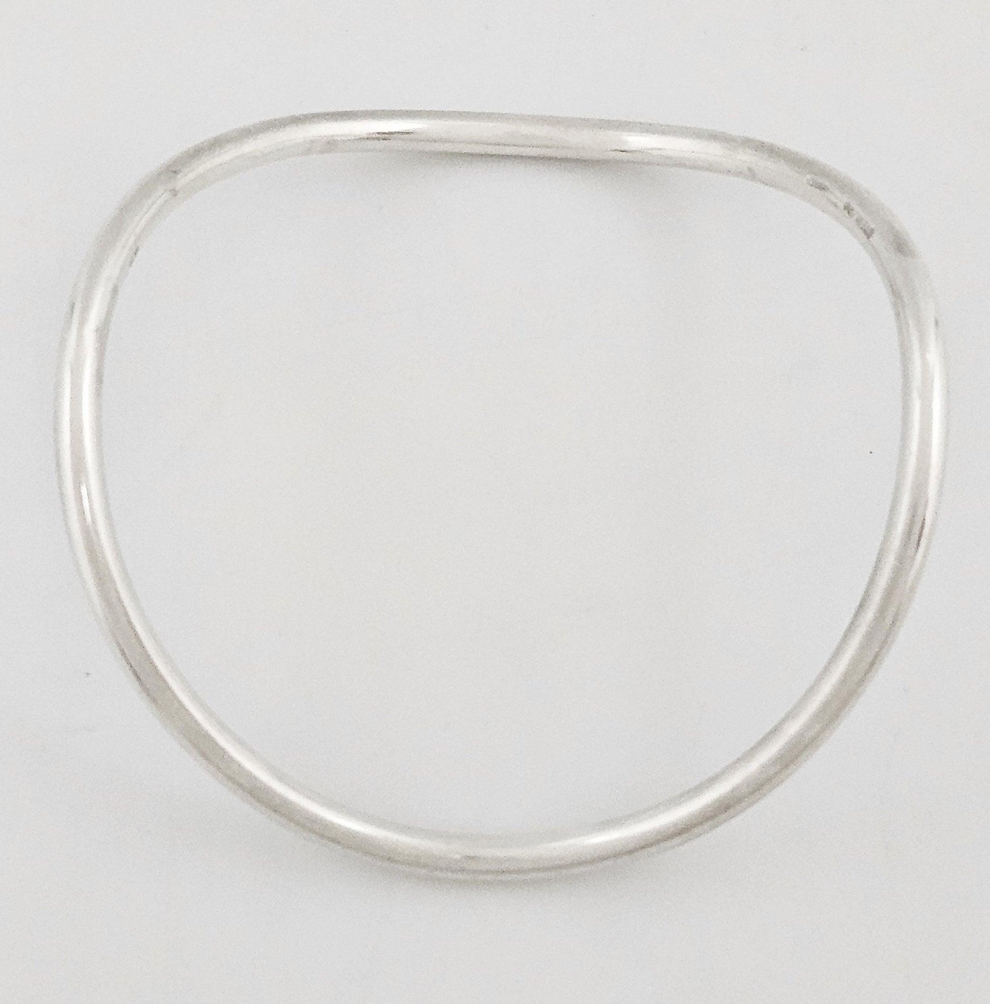Betty Cooke sterling silver modernist Wavy Tubular Bangle Bracelet Circa 1960s, view 1 of 7