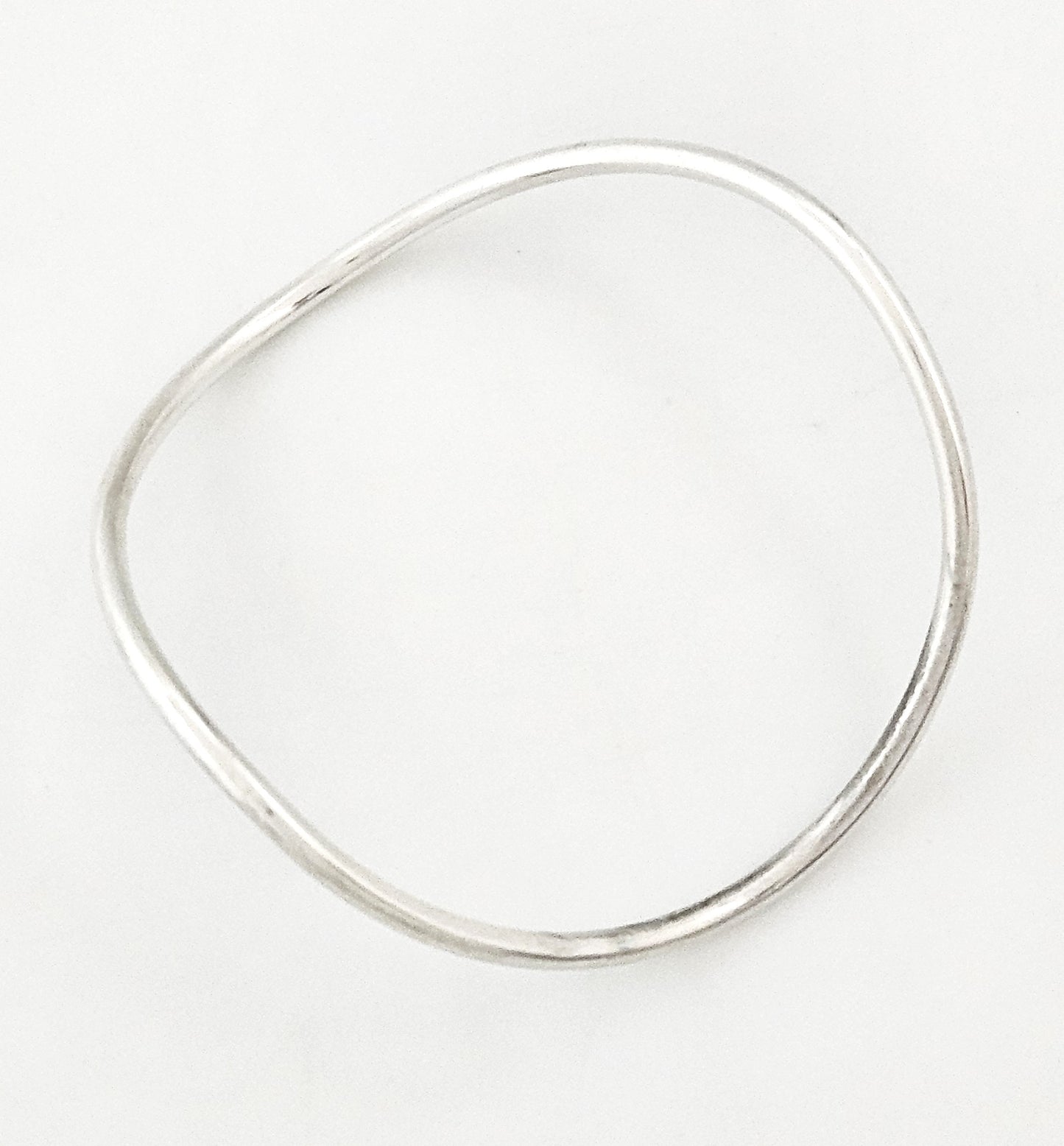 Betty Cooke sterling silver modernist Large Wave Bangle Bracelet Circa 1960s, view 1 of 7